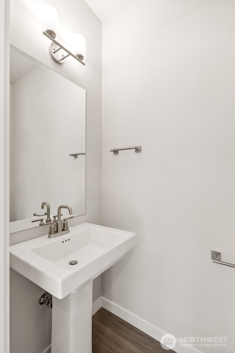 32321 134th Street Southeast Sultan, WA 98294 - Photo 13 of 27 a bathroom with a sink and a mirror