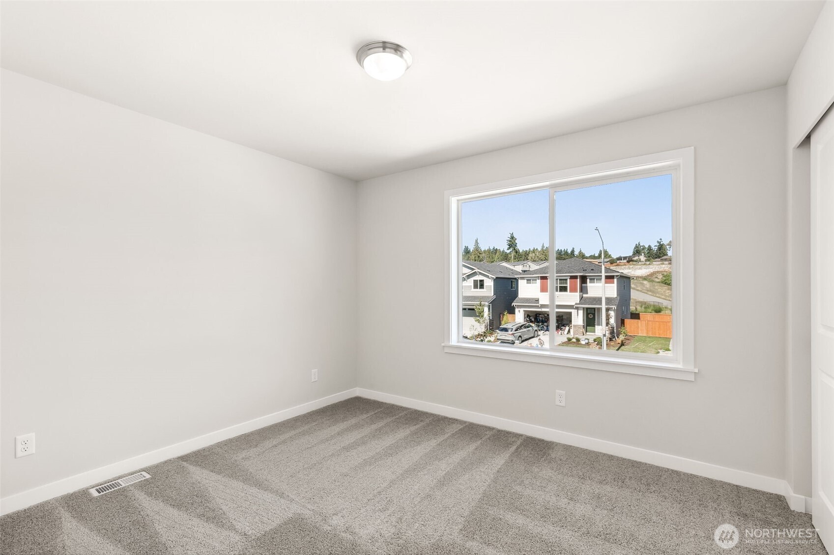 32321 134th Street Southeast Sultan, WA 98294 - Photo 15 of 27 a view of a room that has a large window