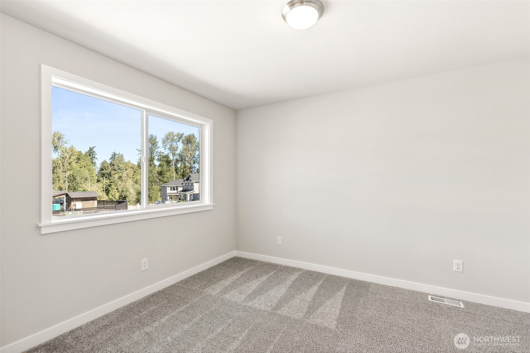 32321 134th Street Southeast Sultan, WA 98294 - Photo 16 of 27 an empty room with a window
