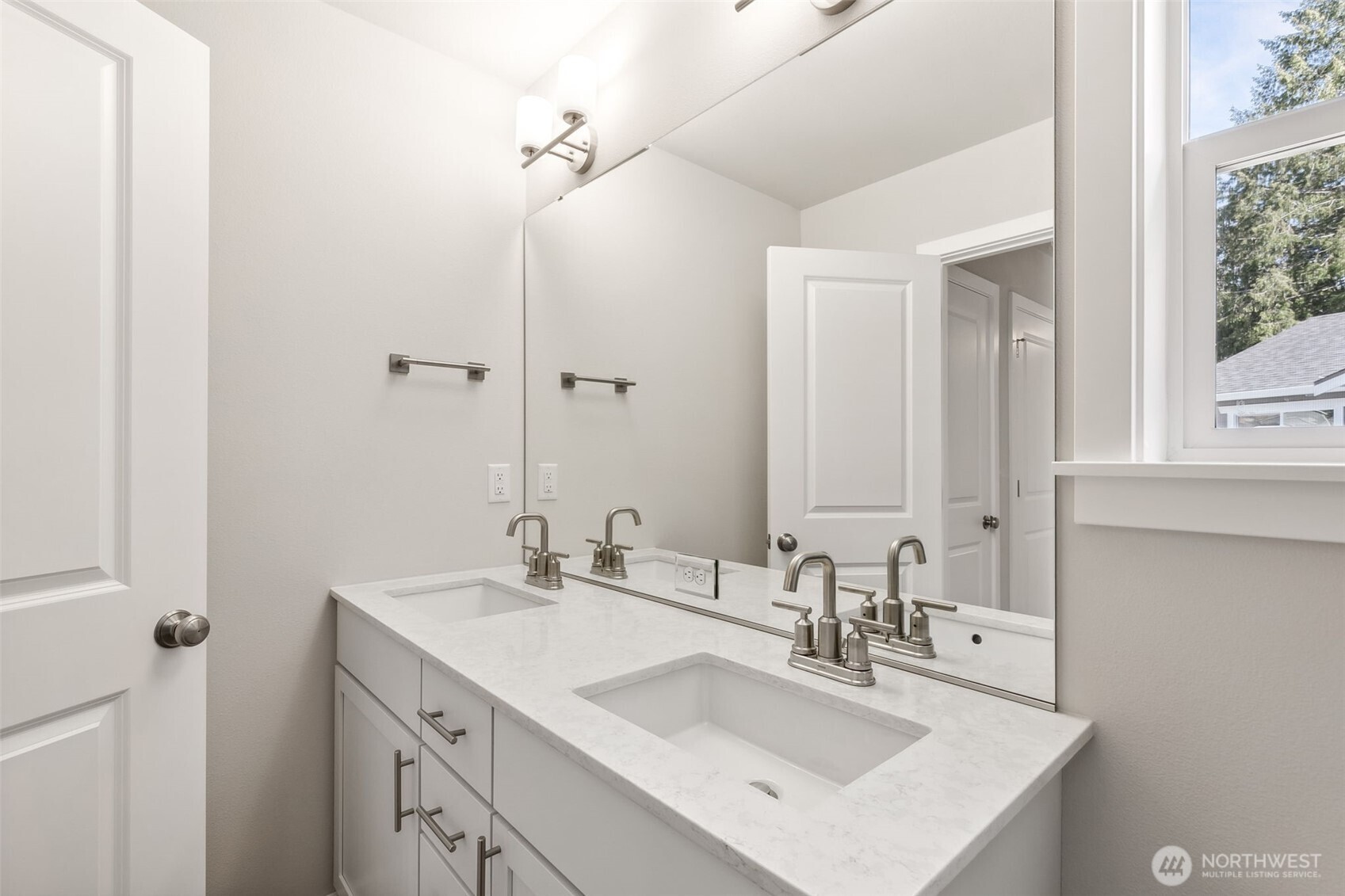 32321 134th Street Southeast Sultan, WA 98294 - Photo 17 of 27 a bathroom with a sink double vanity and a mirror