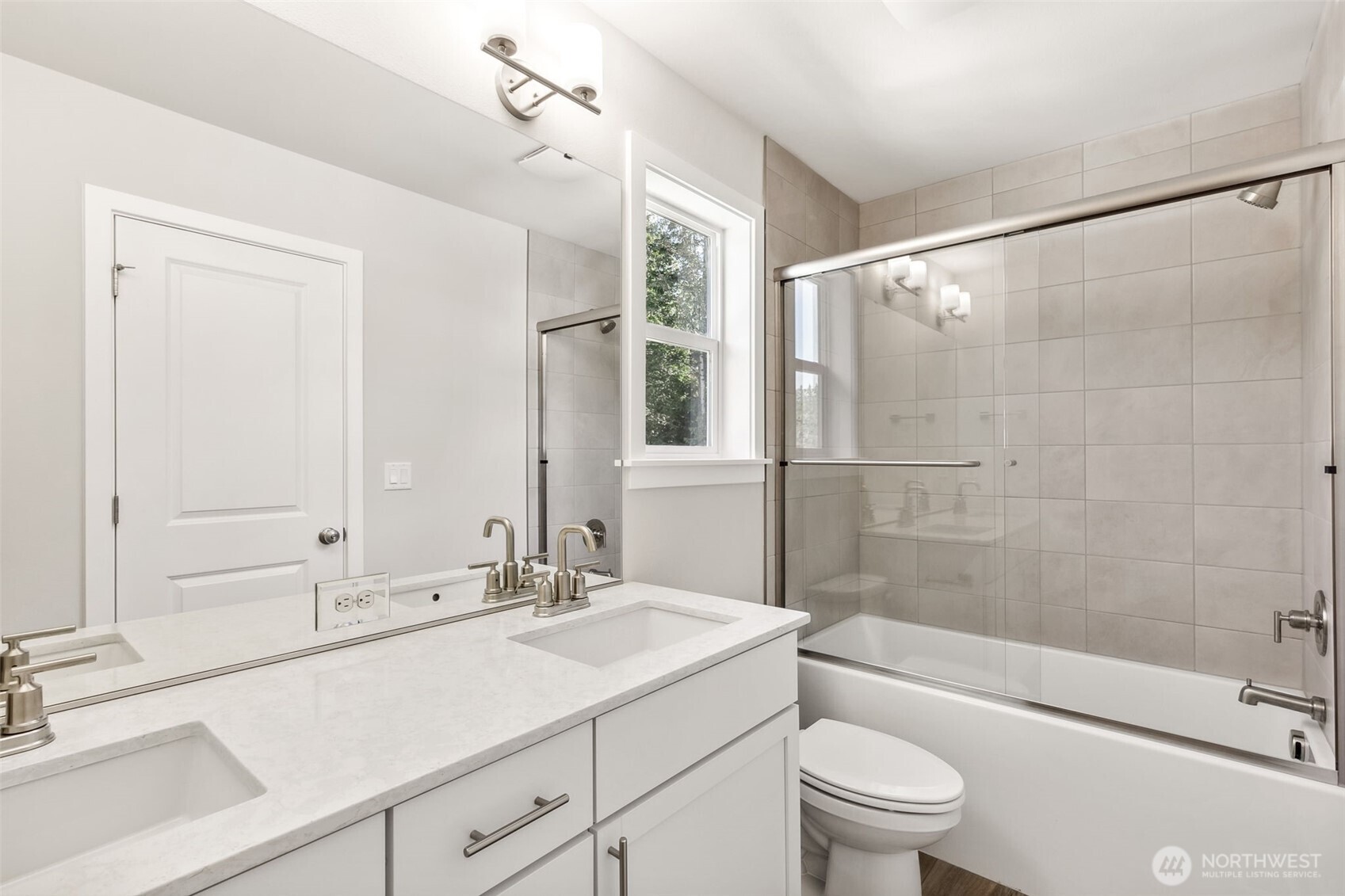 32321 134th Street Southeast Sultan, WA 98294 - Photo 18 of 27 a bathroom with a sink a toilet and shower