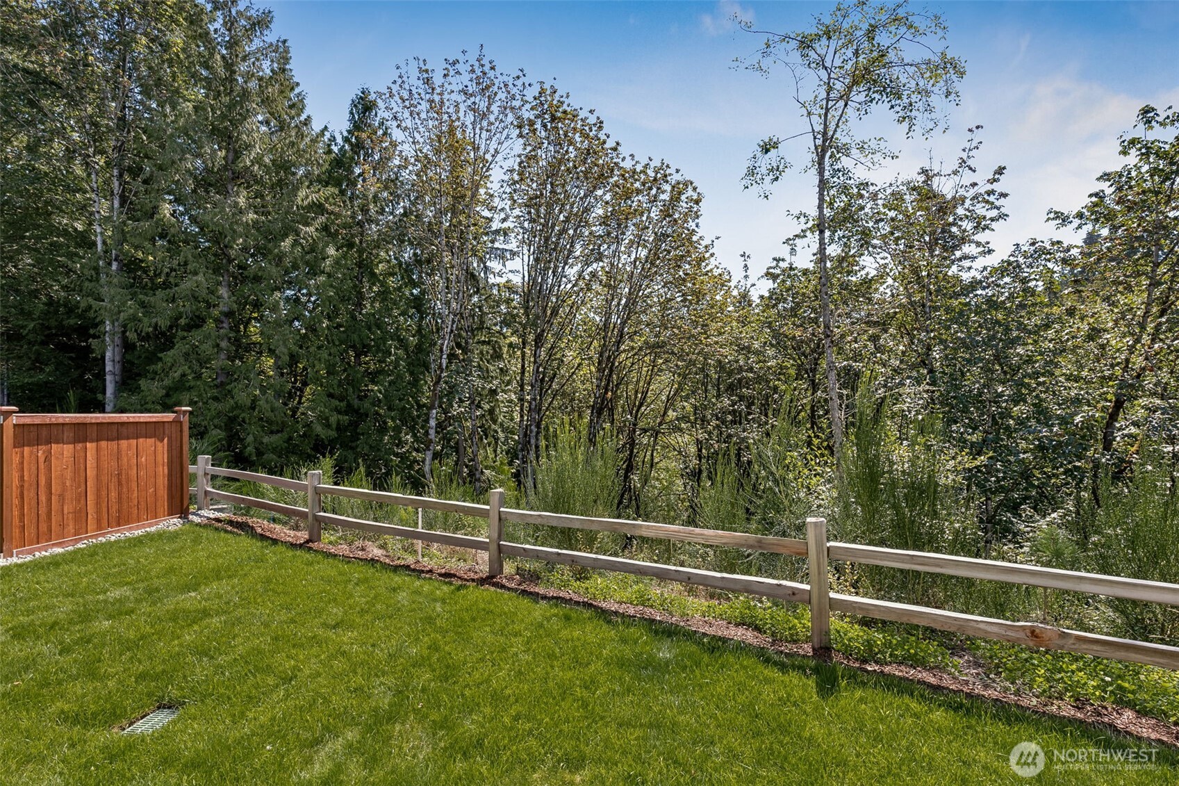 32321 134th Street Southeast Sultan, WA 98294 - Photo 27 of 27 a view of a yard with wooden fence