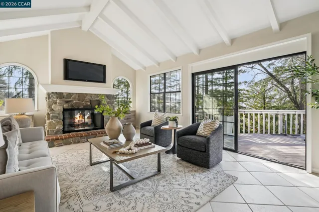 a view of balcony with wooden floor and outdoor seating