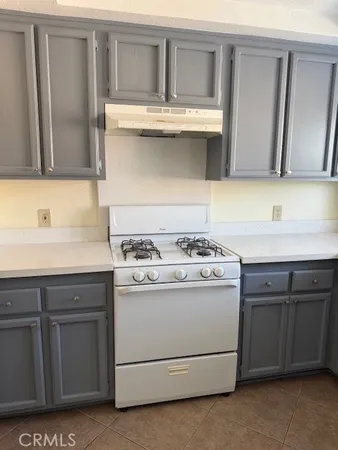 a bathroom with a sink and a window
