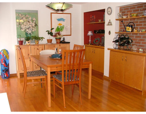 10 Cozy Street, Unit 10 Watertown, MA 02472 - Photo 6 of 11 a dining room with furniture and wooden floor