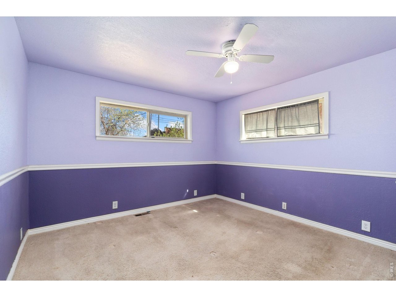 245 6th Street Frederick, CO 80530 - Photo 11 of 17 a view of an empty room with a window