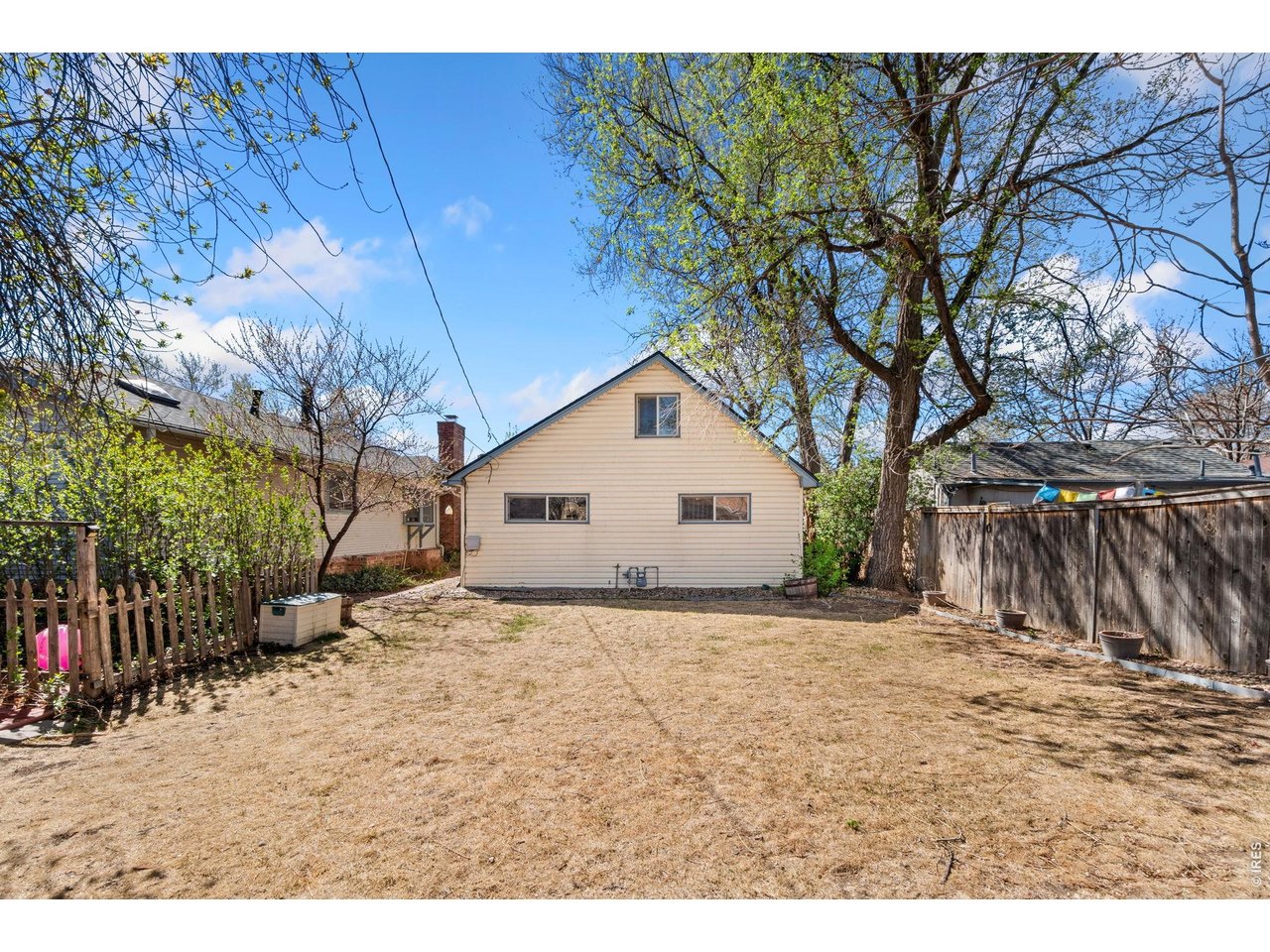 245 6th Street Frederick, CO 80530 - Photo 16 of 17 a view of a house with a yard