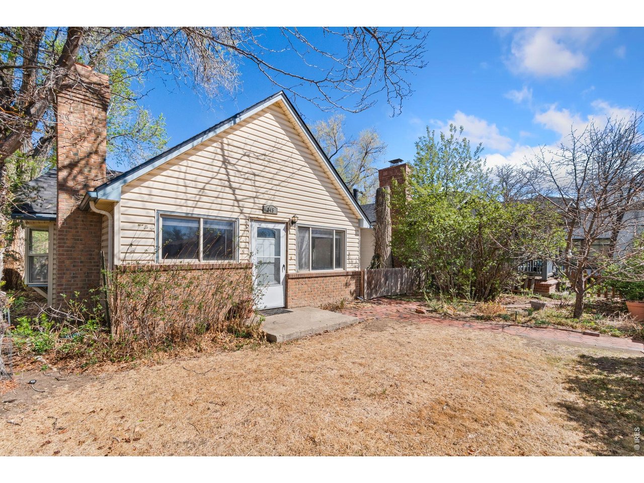 245 6th Street Frederick, CO 80530 - Photo 4 of 17 a view of a house with a yard