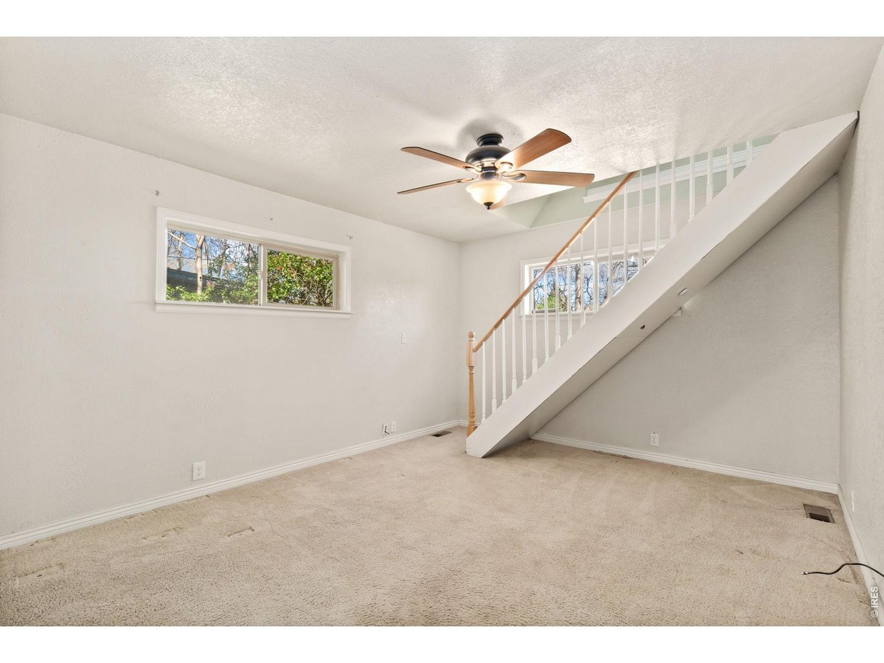 245 6th Street Frederick, CO 80530 - Photo 10 of 17 a view of an entryway with a fan