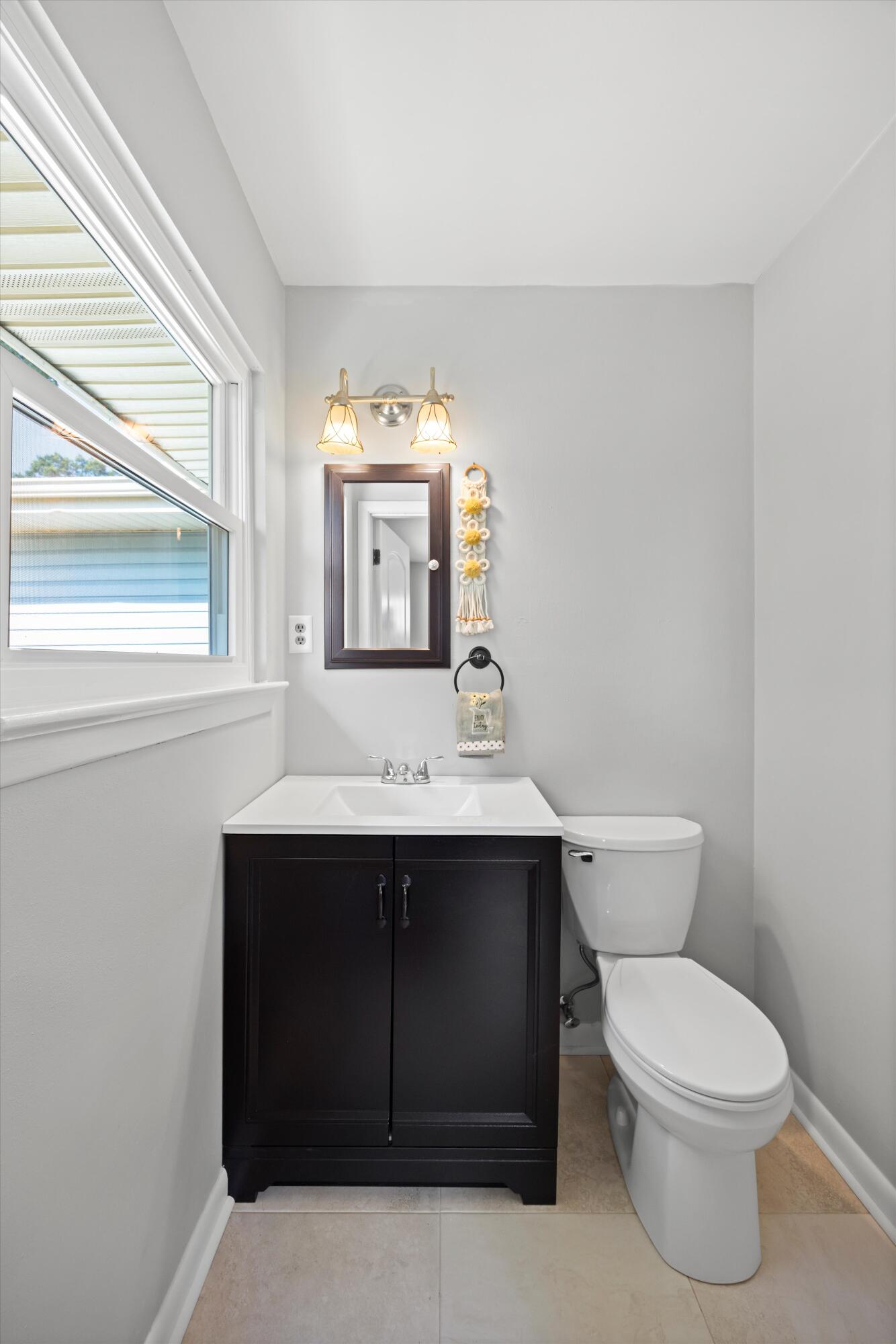 76 Roswell Road Rossville, GA 30741 - Photo 25 of 32 REMODELED HALF BATH