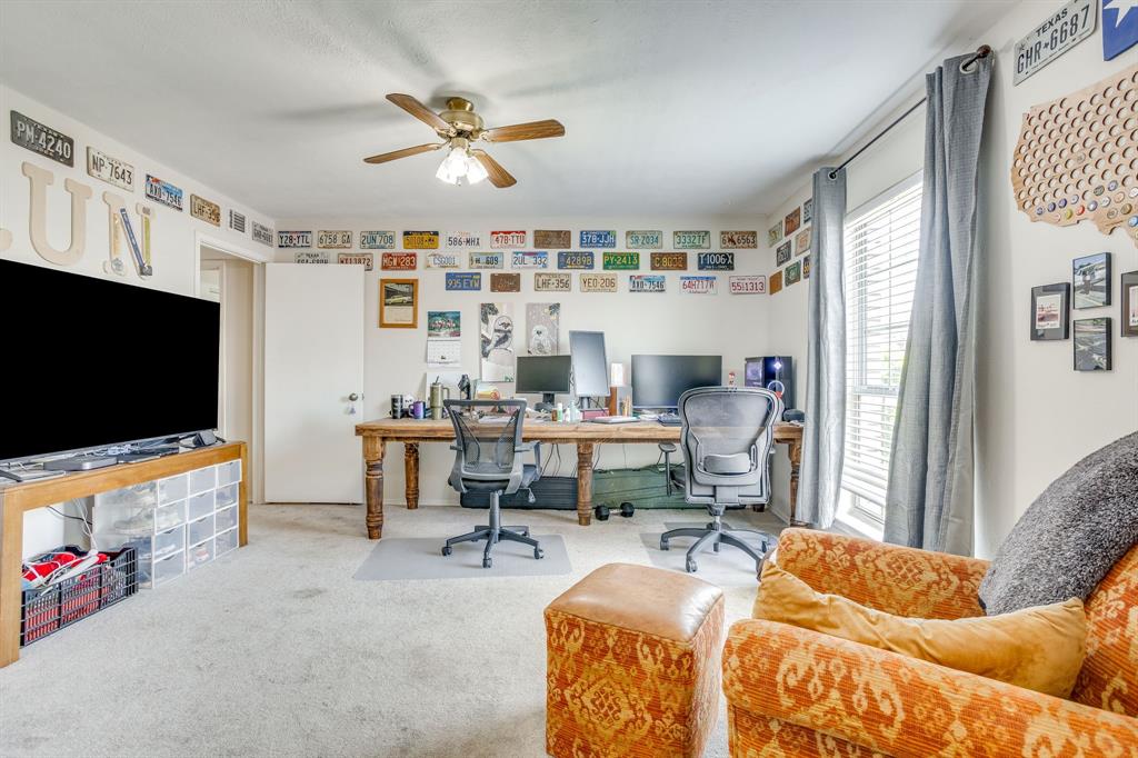 4102 Ridglea Country Club Drive, Unit 1503 Fort Worth, TX 76126 - Photo 9 of 21 Versatile room featuring light-colored carpeting, a ceiling fan with integrated lighting, and a large window with blinds