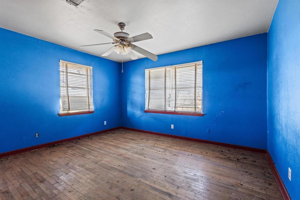 3467 East Fm 120 Denison, TX 75021 - Photo 20 of 38 a view of an empty room window and wooden floor