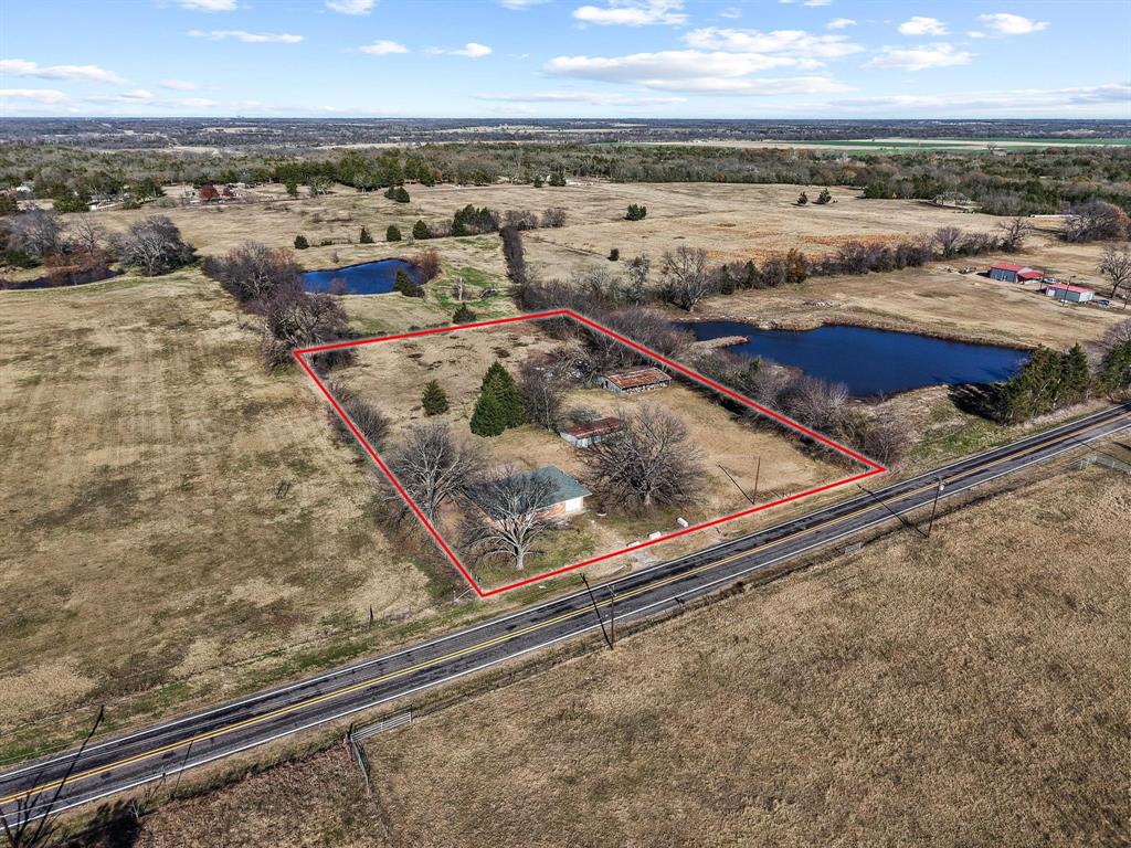 3467 East Fm 120 Denison, TX 75021 - Photo 30 of 38 a view of a buildings from a city