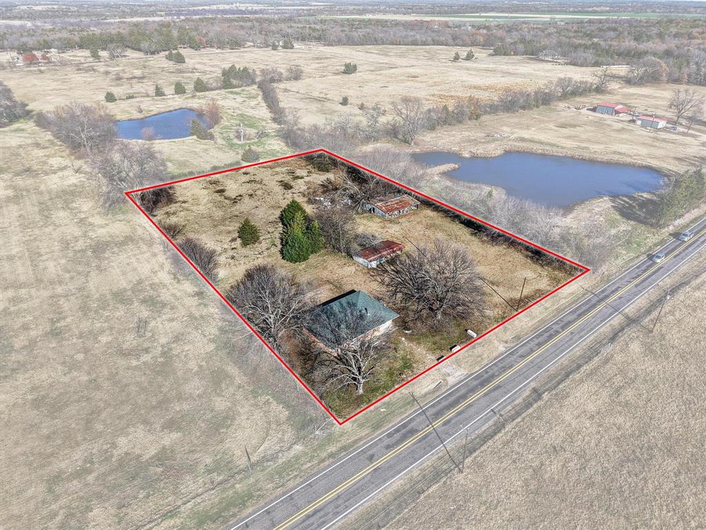 3467 East Fm 120 Denison, TX 75021 - Photo 32 of 38 a wooden floor with a lake view