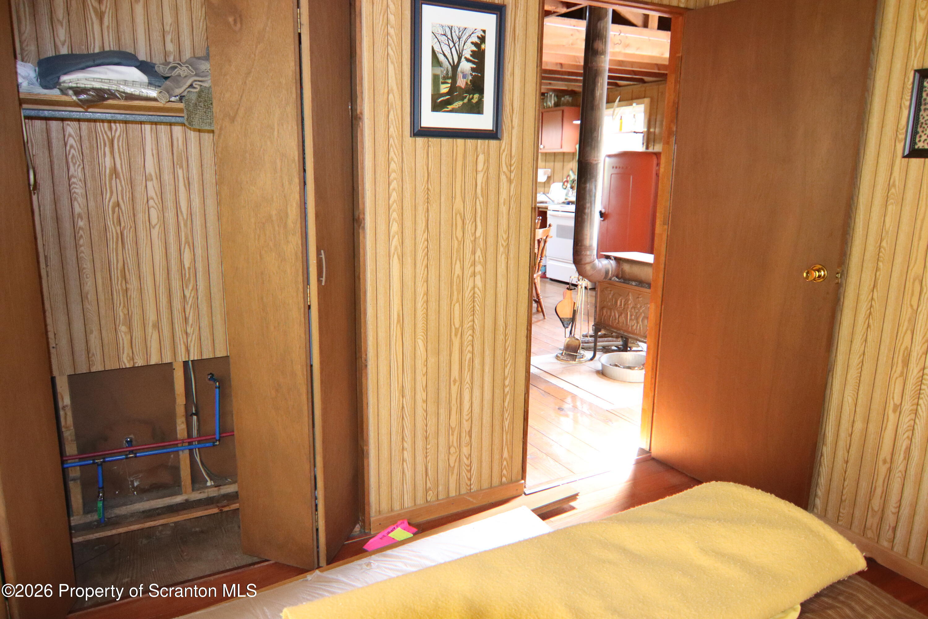 300 Pennsworth Hill Road Meshoppen, PA 18630 - Photo 20 of 38 a bedroom with a bed and a window