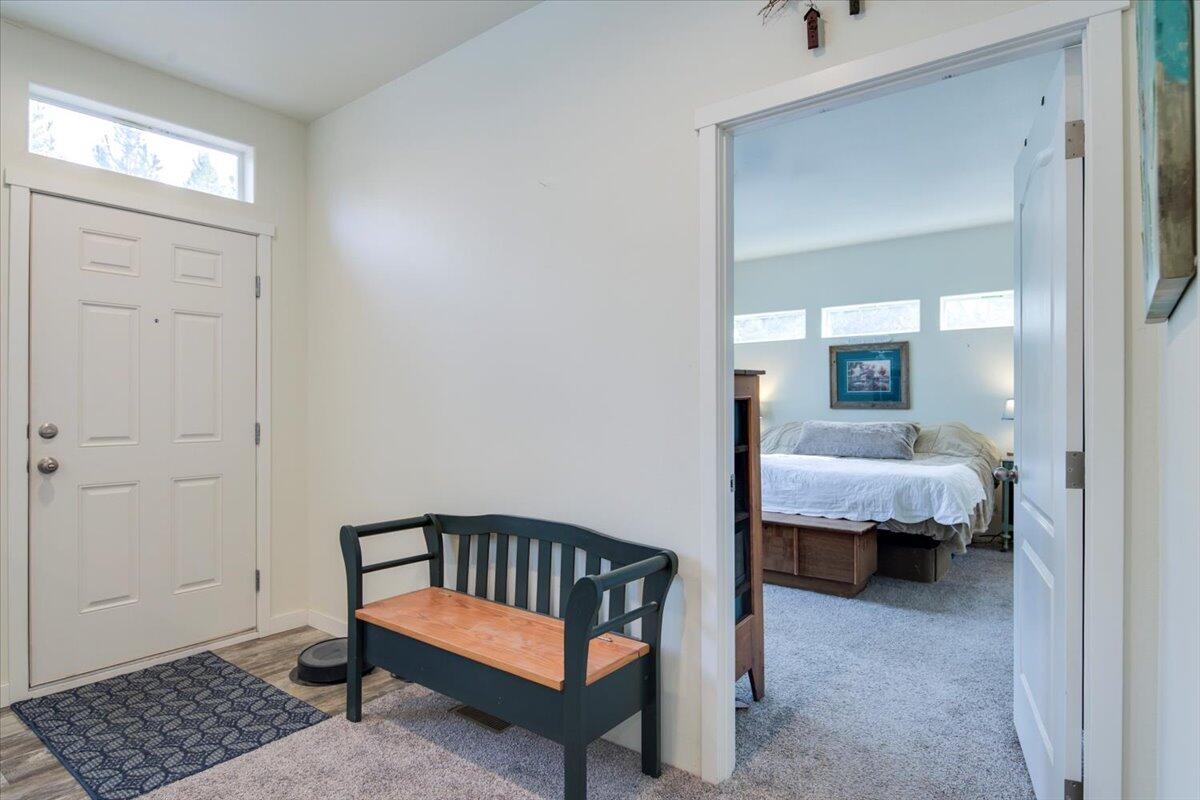 15461 Federal Road La Pine, OR 97739 - Photo 28 of 68 Entry to primary bedroom off the entrance offering separation and privacy