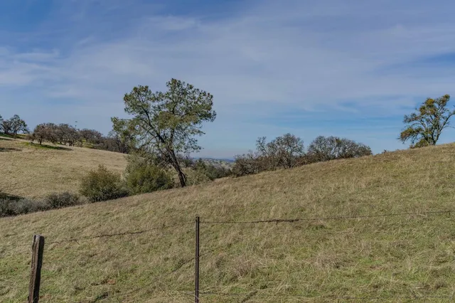 a view of a beach with a lake