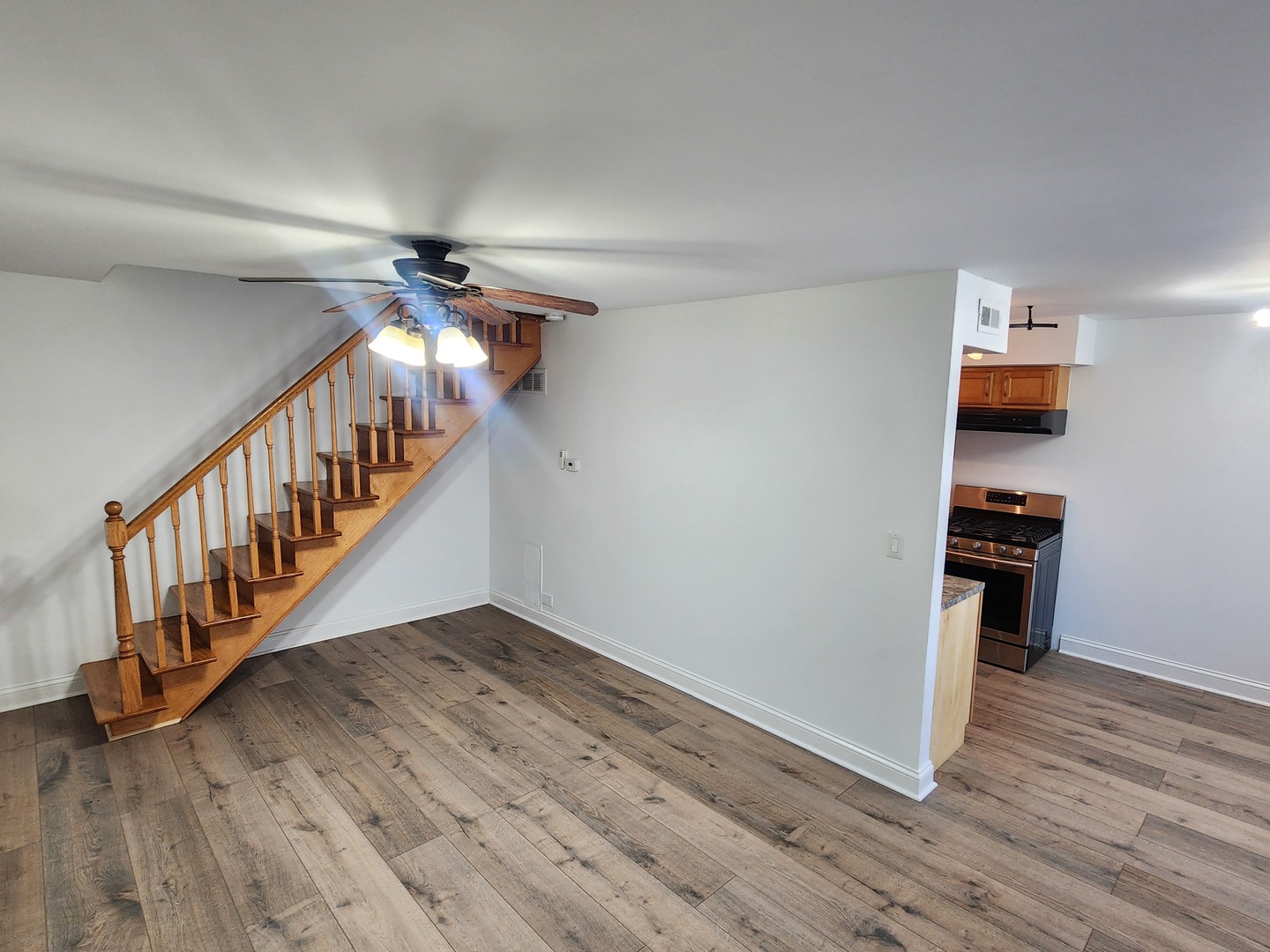 1597 Cove Drive, Unit 185C Prospect Heights, IL 60070 - Photo 6 of 12 a view of entryway and hall with wooden floor