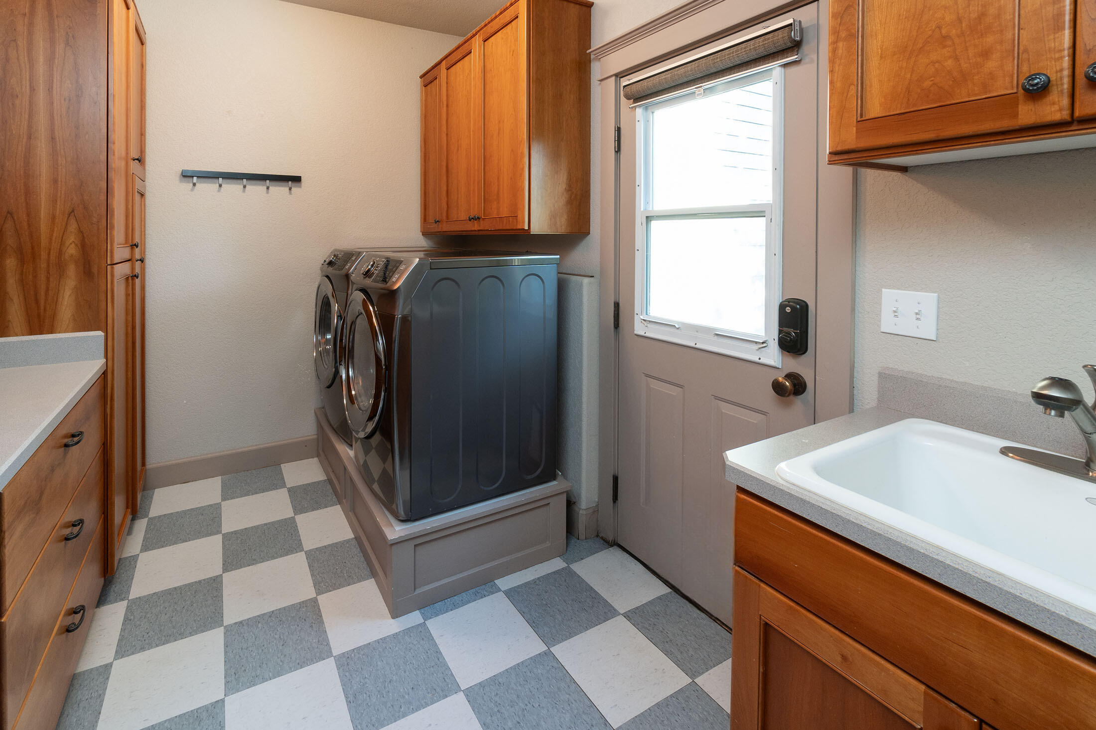 63475 Overtree Road Bend, OR 97701 - Photo 20 of 39 a bathroom with a sink a toilet and a mirror