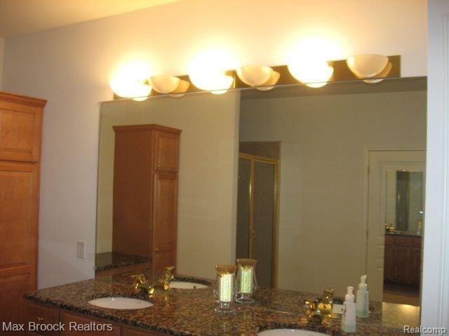 3700 Tremonte Circle, Unit 85 Rochester, MI 48306 - Photo 14 of 18 TREMONTE MSTR BATH 1.jpg