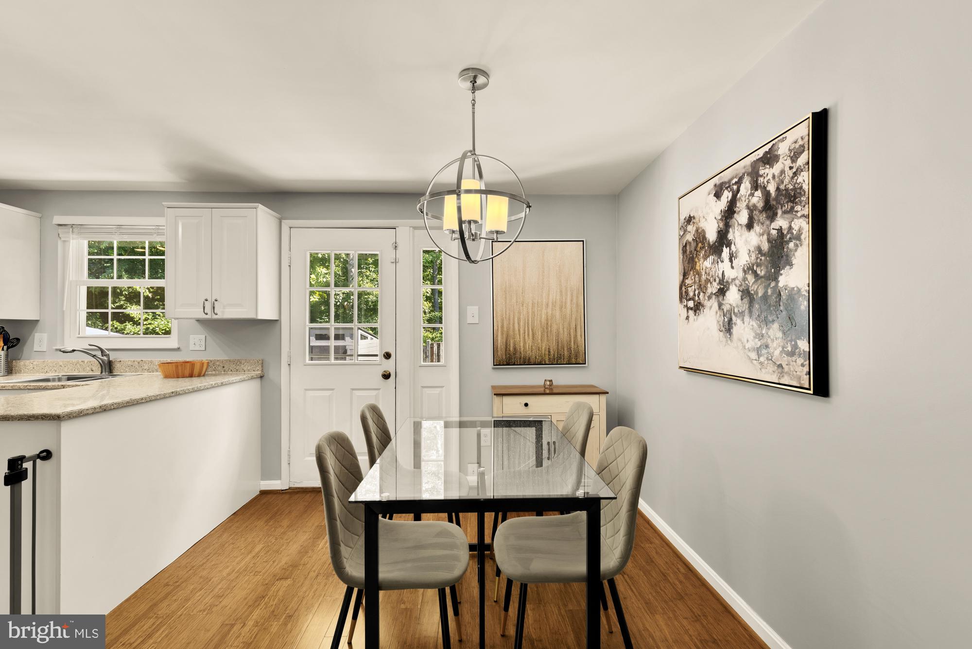 8100 Loving Forest Court Springfield, VA 22153 - Photo 8 of 33 a view of a dining room with furniture window and wooden floor