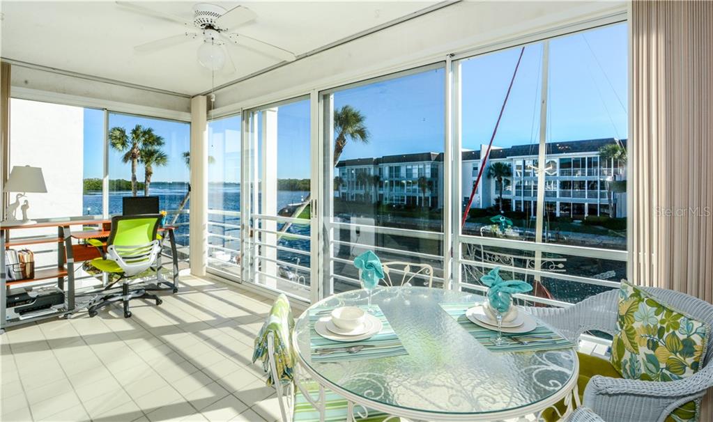 4410 Exeter Drive, Unit 204 Longboat Key, FL 34228 - Photo 1 of 1 With glass all around, you'll love the Bay views.