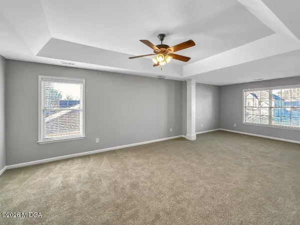 a view of an empty room and window