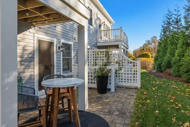 a view of a chairs and table in the patio