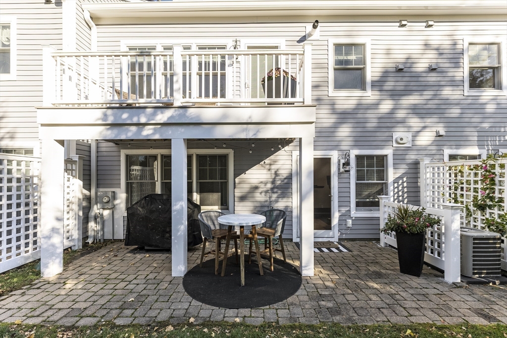 60 Robbins Road, Unit 25 Plymouth, MA 02360 - Photo 16 of 42 a view of a house with outdoor seating