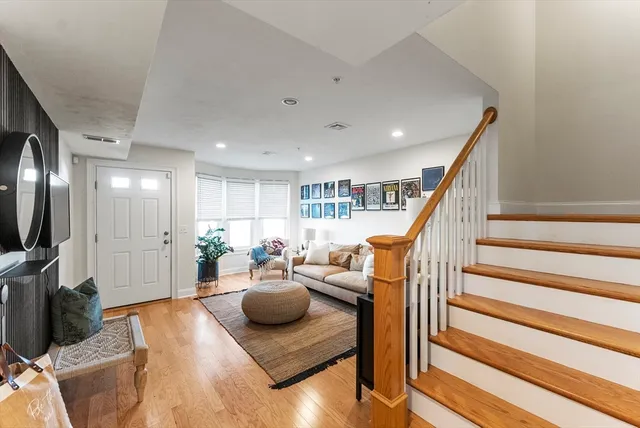 a view of a living room and workspace