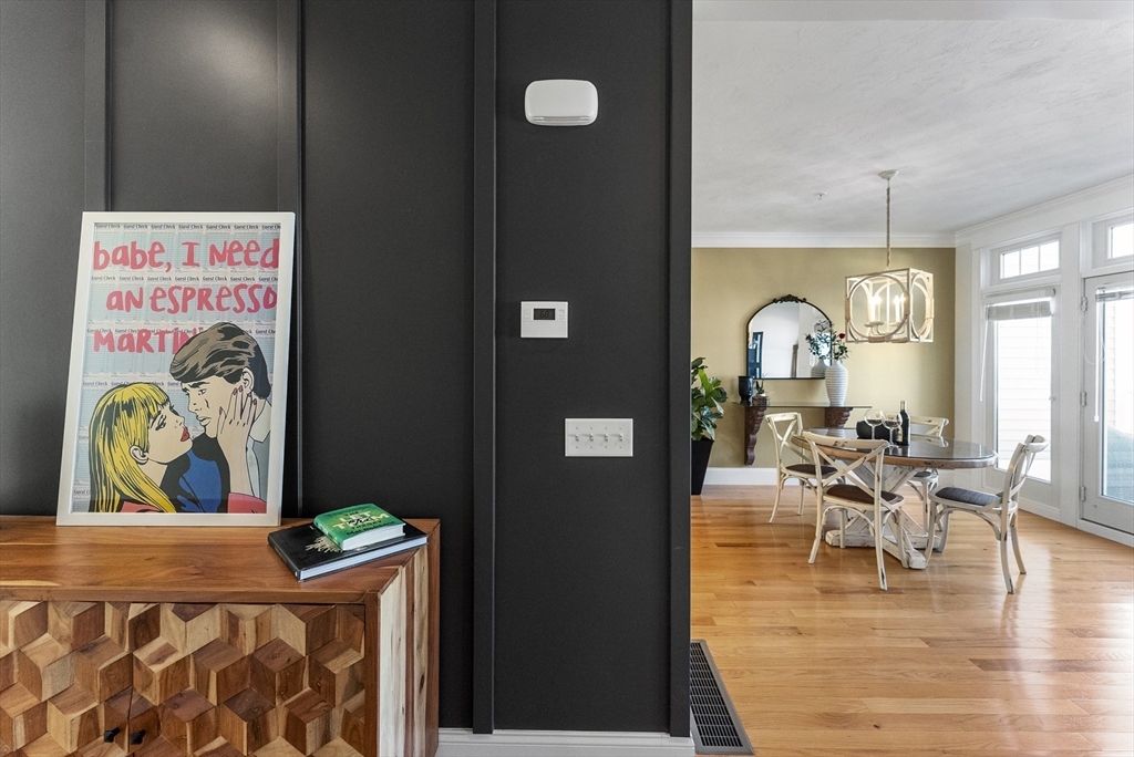 60 Robbins Road, Unit 25 Plymouth, MA 02360 - Photo 18 of 42 a living room with furniture and wooden floor