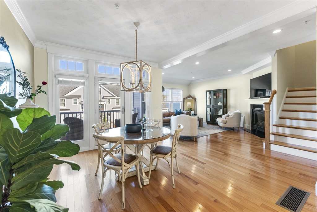 60 Robbins Road, Unit 25 Plymouth, MA 02360 - Photo 19 of 42 a view of a dining room with furniture window and wooden floor