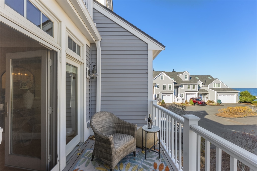 60 Robbins Road, Unit 25 Plymouth, MA 02360 - Photo 21 of 42 a balcony view with couple of chairs