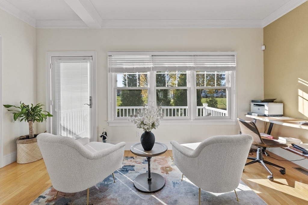 60 Robbins Road, Unit 25 Plymouth, MA 02360 - Photo 31 of 42 a living room with furniture and a large window