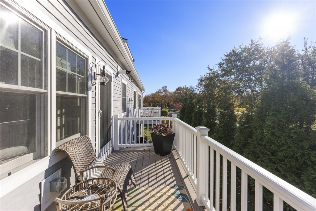 60 Robbins Road, Unit 25 Plymouth, MA 02360 - Photo 32 of 42 a balcony view with a seating space