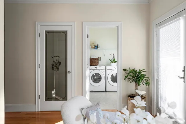 a view of a bedroom with furniture and entryway