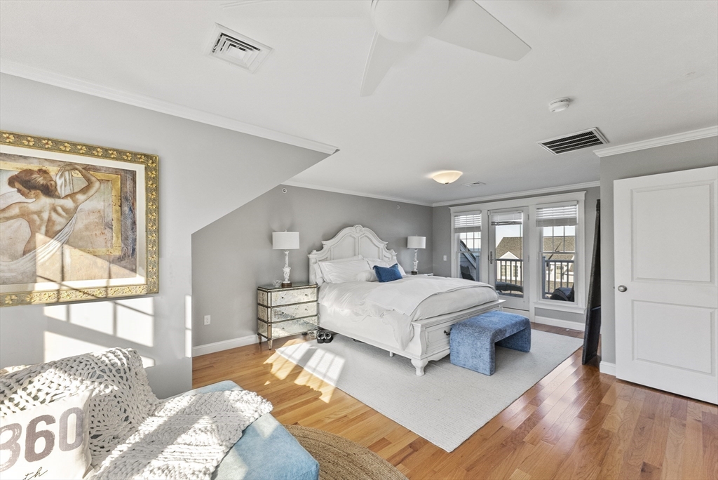 60 Robbins Road, Unit 25 Plymouth, MA 02360 - Photo 36 of 42 a bedroom with a large bed and a window