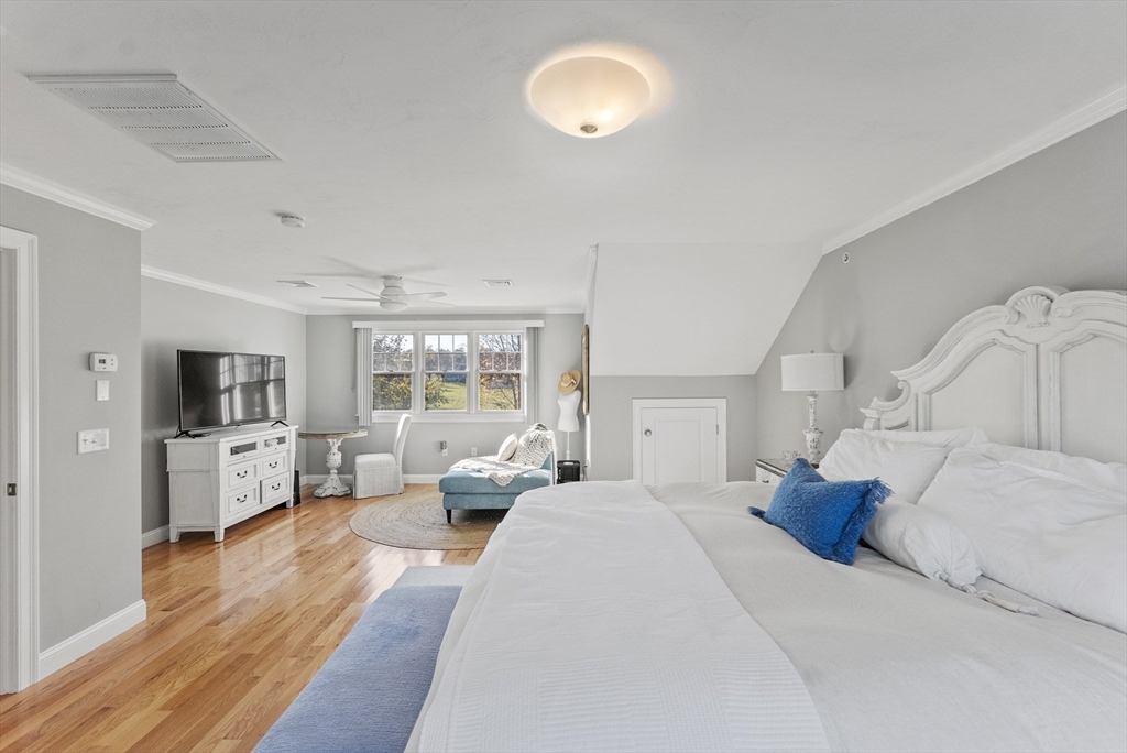 60 Robbins Road, Unit 25 Plymouth, MA 02360 - Photo 41 of 42 a living room with furniture large window and flat screen tv