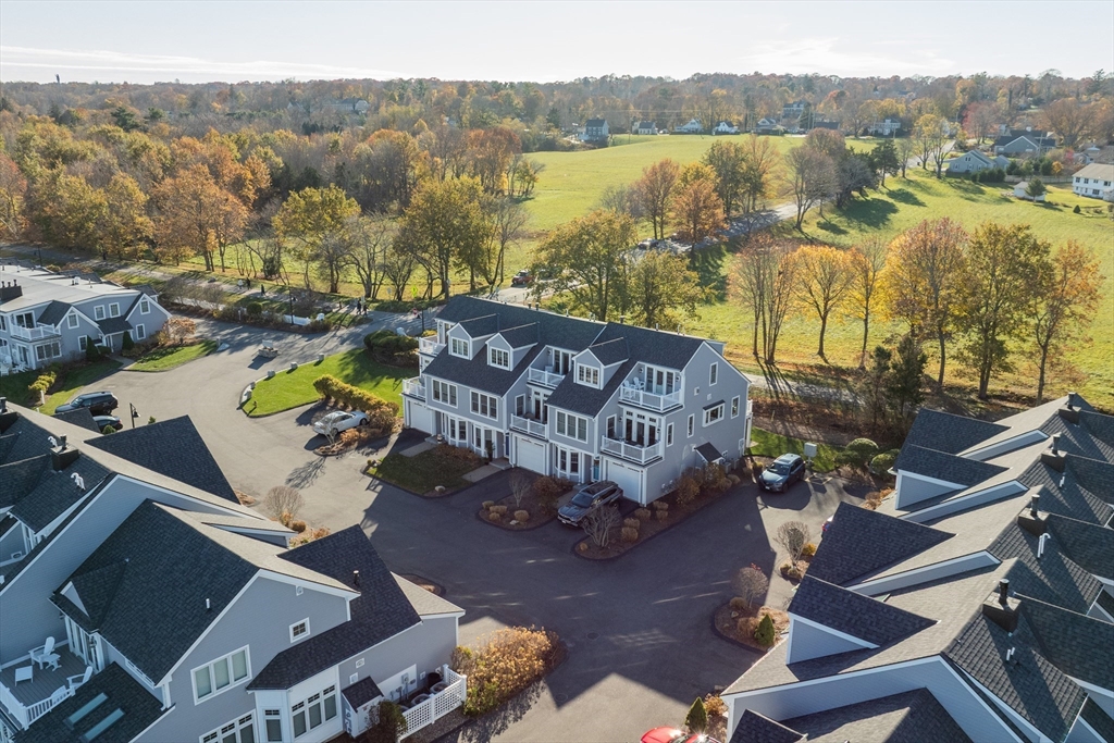 60 Robbins Road, Unit 25 Plymouth, MA 02360 - Photo 6 of 42 a view of a swimming pool with a patio
