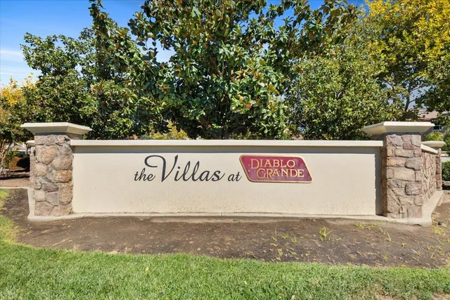 a sign broad on the side of the road