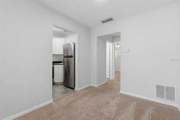 a view of a kitchen with a sink