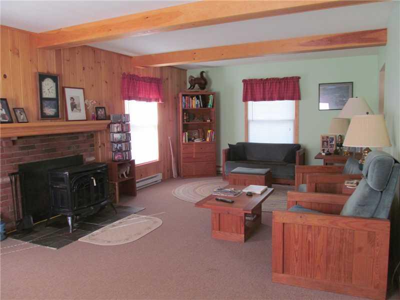 476 Shapleigh Corner Road Shapleigh, ME 04076 - Photo 4 of 22 Living Room. Note the abundance of...