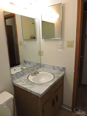 a bathroom with a shower a bathtub and a shower