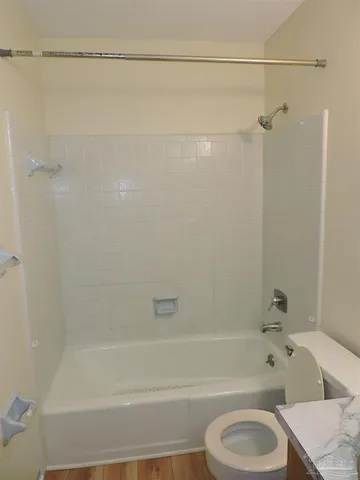 a view of a house with swimming pool and a yard