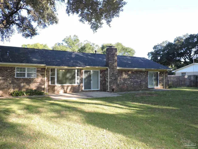 a view of a yard with a trees