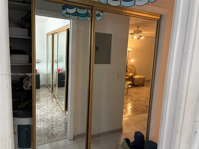 a bathroom with a tub and shower