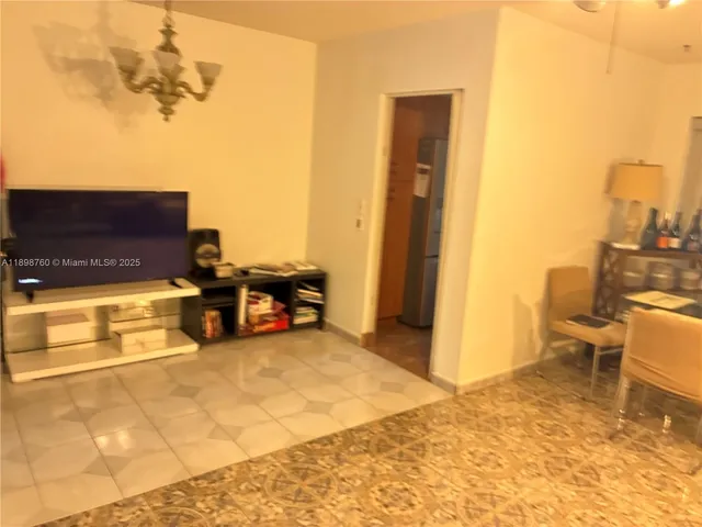 a room with furniture and a rug