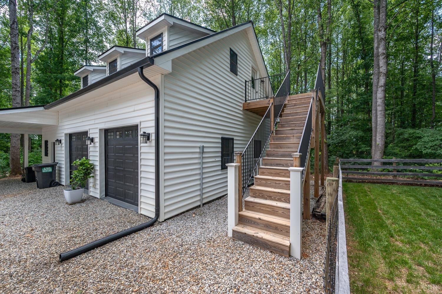 51 Hughes Road Farmville, VA 23901 - Photo 36 of 63 a view of a house with backyard and deck