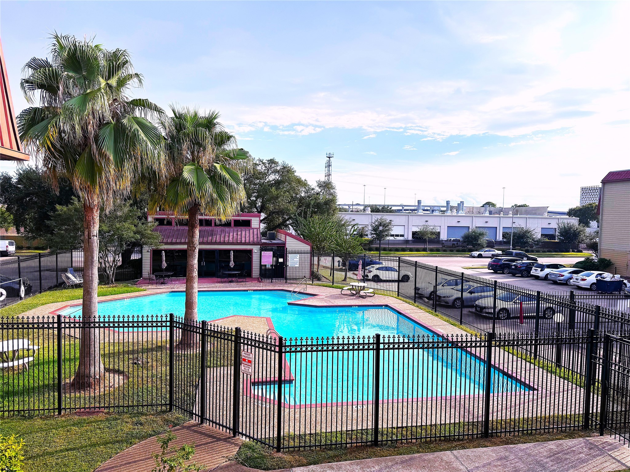 10110 Forum W Drive, Unit 421 Houston, TX 77036 - Photo 26 of 27 a view of a backyard with a swimming pool and furniture