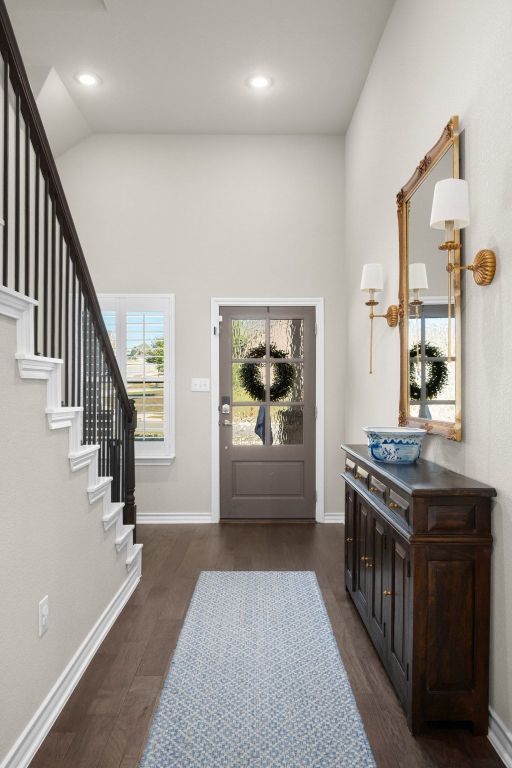 280 Pepperbark Loop Buda, TX 78610 - Photo 5 of 38 Entrance foyer with stairway, dark wood finished floors, and recessed lighting